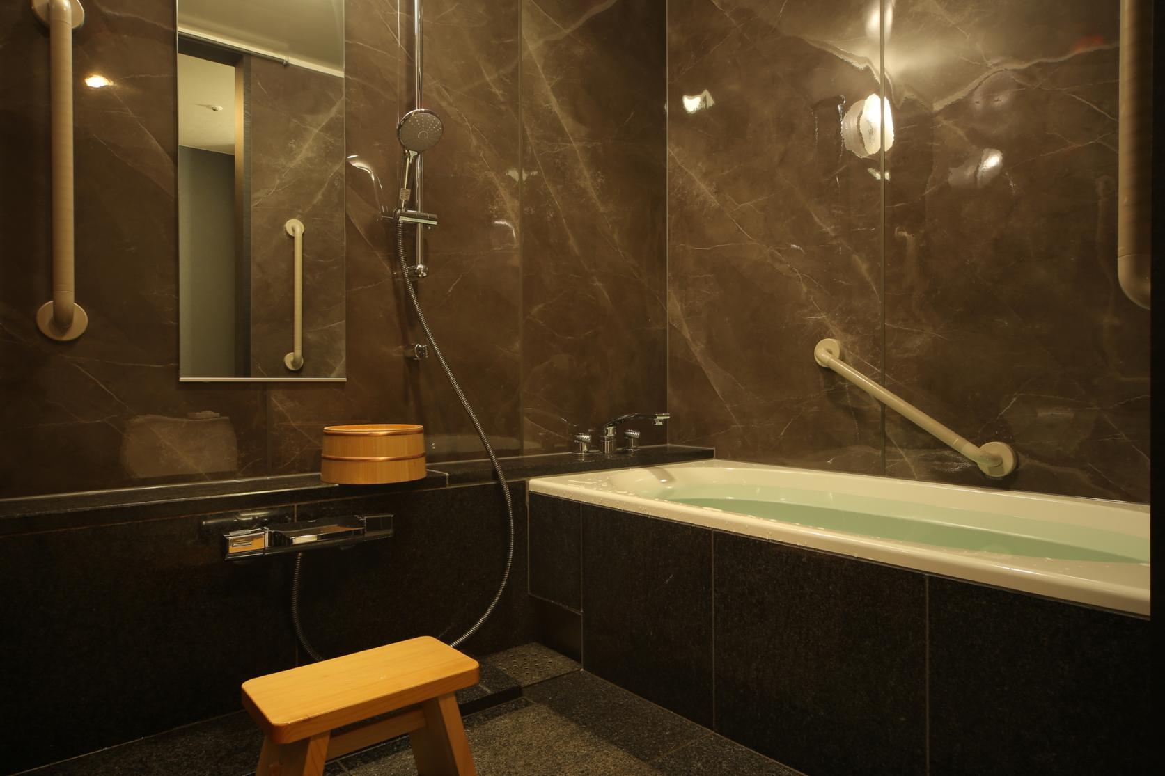 洗練された客室で贅沢なひと時を過ごす-5