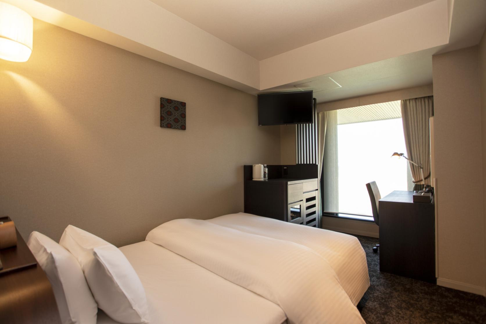 洗練された客室で贅沢なひと時を過ごす-4